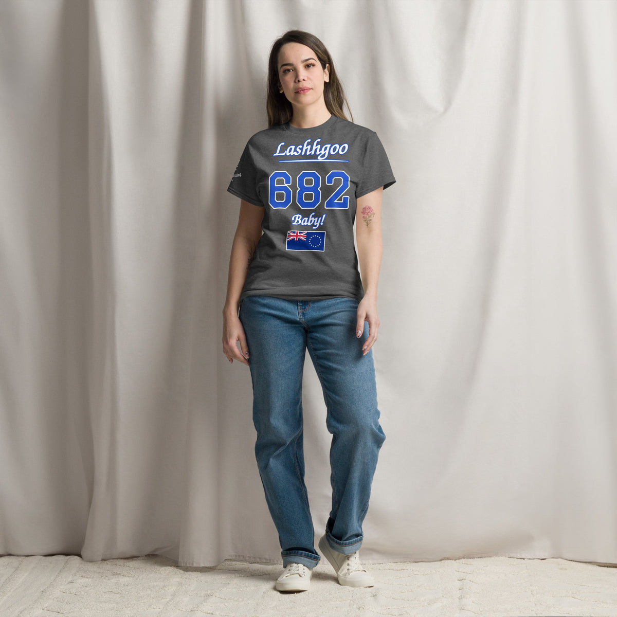 Woman wearing the dark heather Lashhgoo 682 Baby! T-Shirt
