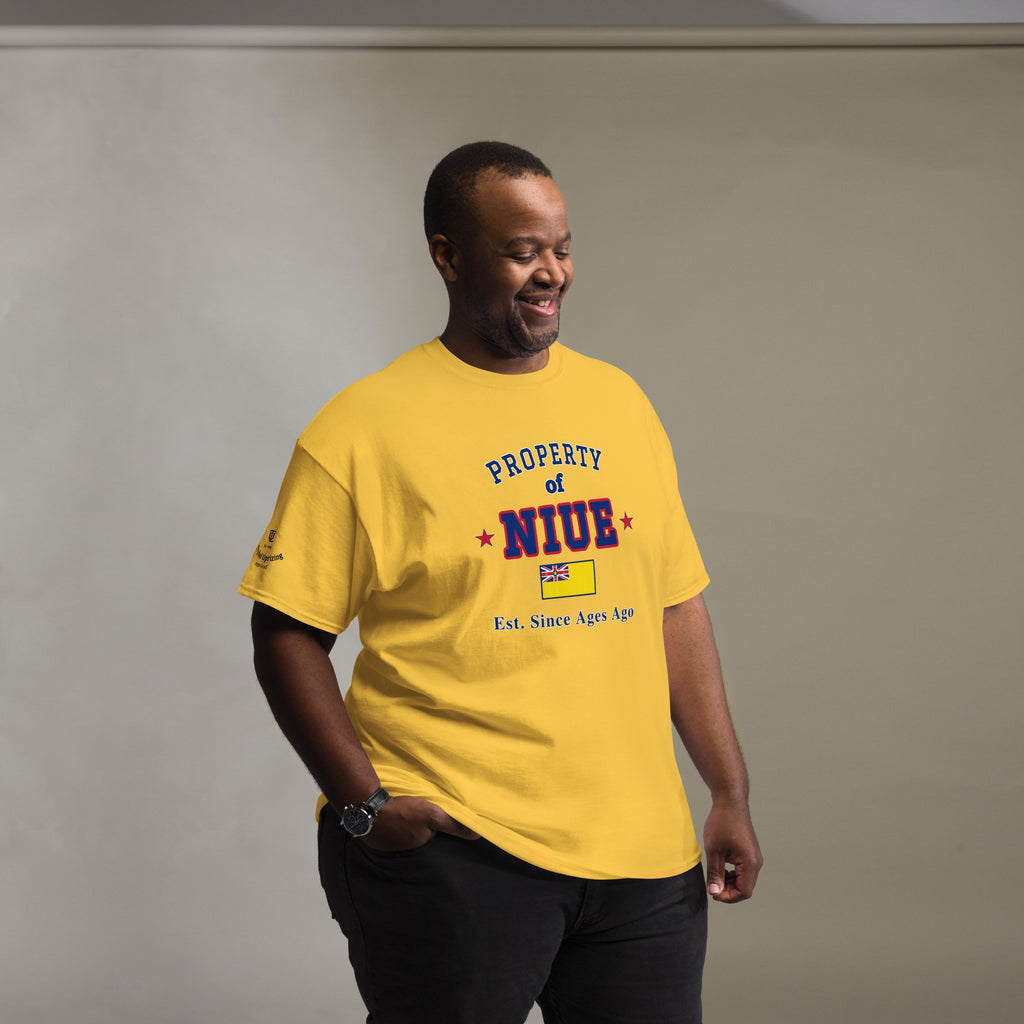Man wearing the yellow Property of Niue T-Shirt