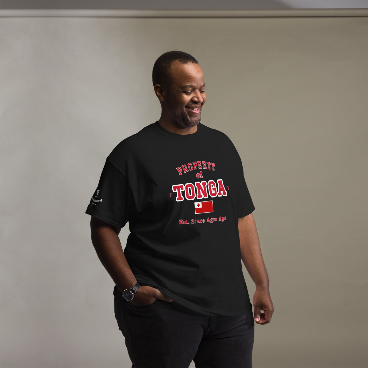 Man wearing the black Property of Tonga T-Shirt