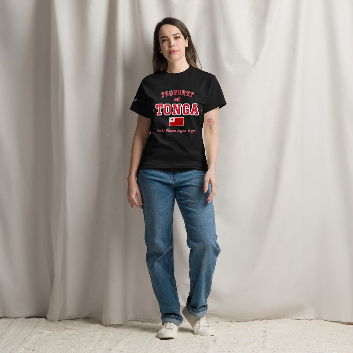 Woman wearing the black Property of Tonga T-Shirt